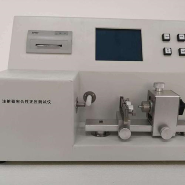 Positive pressure tester for medical syringes
